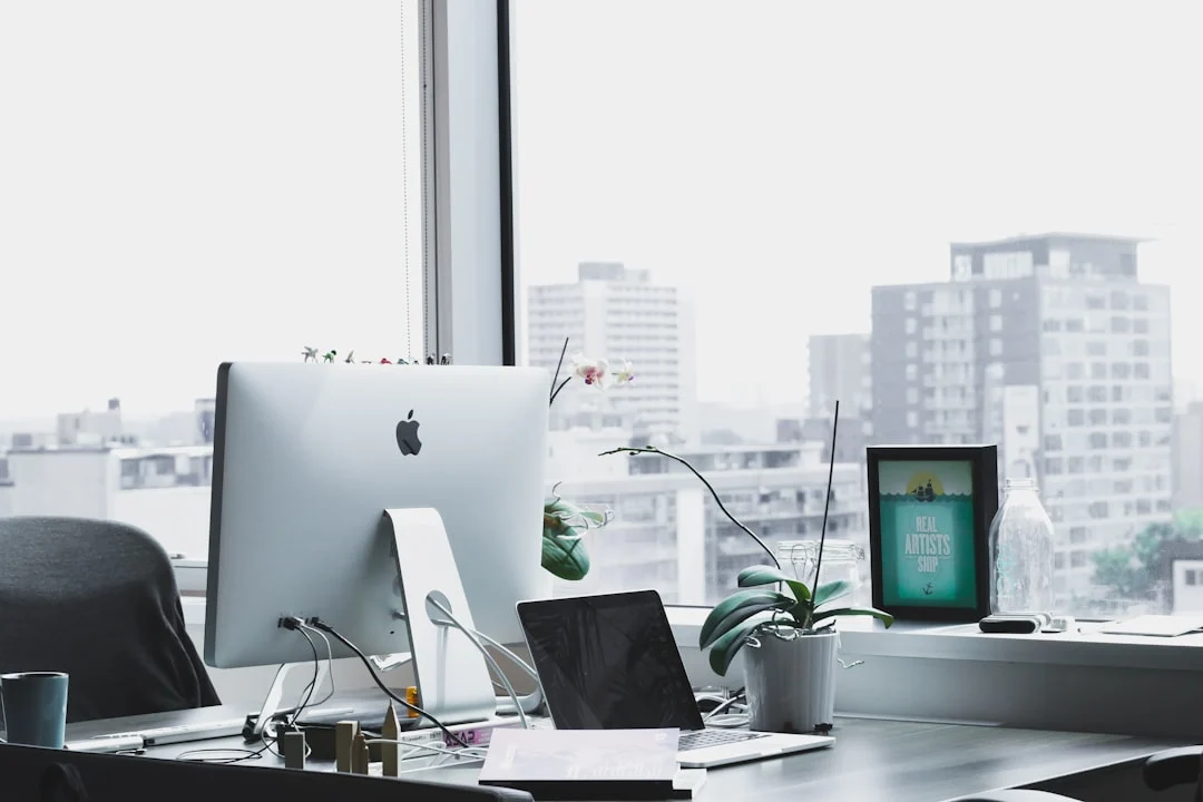 Clean office desk with computer and organized workspace
